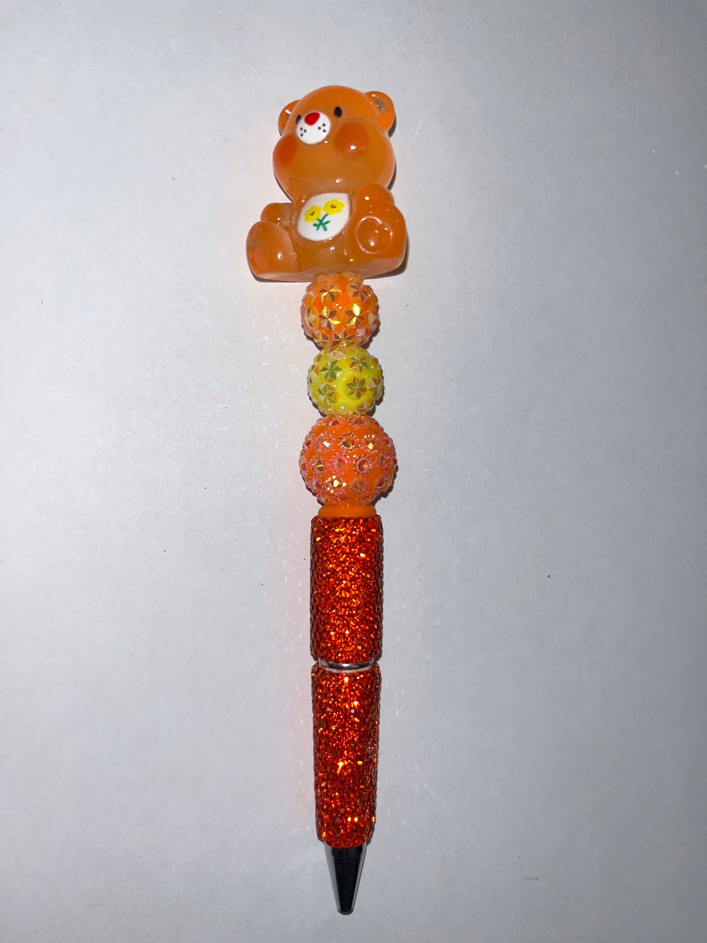 Orange Care Bear Rhinestone Pen